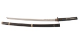 Signed Japanese Sword with Engraved Blade