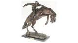 Wooly Chaps Bronze by Fredric Remington