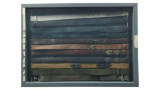 Display Case of Eleven U.S. Military Slings