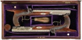 Cased Pair of German Silver Barreled English Percussion Pistols