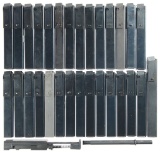 Grouping of Magazines and Accessories for MAC Submachine Guns