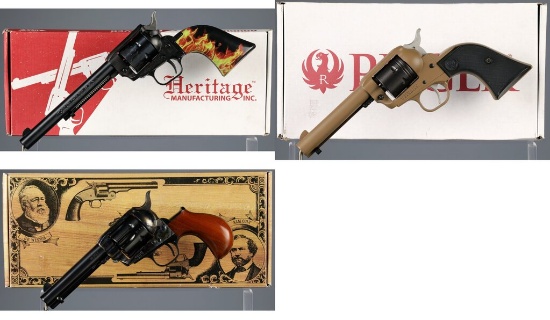 Three Single Action Revolvers with Boxes