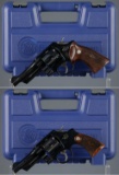 Two Smith & Wesson Double Action Revolvers with Cases