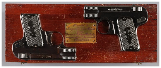 Two Phoenix Pocket Semi-Automatic Pistols with Inscribed Case