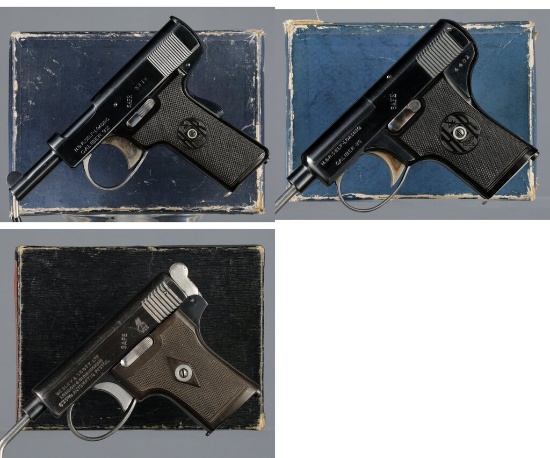 Three Self-Loading Pistols with Boxes