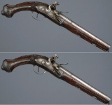 Pair of Engraved and Carved Spanish Flintlock Pistols