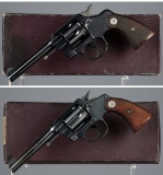 Two Colt Double Action Revolvers with Boxes