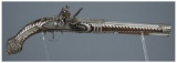 Ornate Silver Mounted Flintlock Pistol