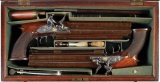Cased Pair of Over/Under Flintlock Pistols by Samuel Brunn