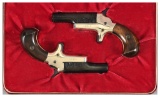 Two Cased Pairs of Colt Fourth Model Derringers