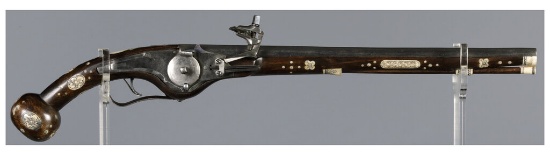 Ornate Wheellock Pistol with Engraved Stock Inlays