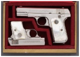 Two Colt Pistols with Pearl Grips and Case