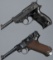Two WWII Era German Military Mauser Pistols with Holsters