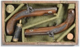 Cased Pair of Engraved Wheeler & Son Percussion Pistols