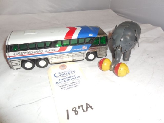 Greyhound Bus & Tin Mechanical Elephant