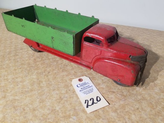 Vintage red truck with green box