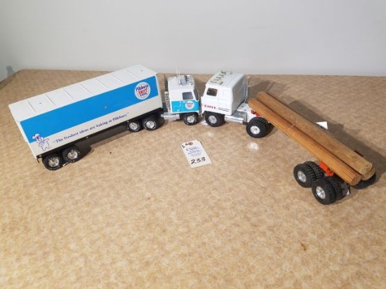 Ertl tractor and log trailer
