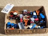 Mixed lot of 1/64 Die Cast Tractors Ford, New holland, Versatile, Massey Ferguson, and Case (14) w/w