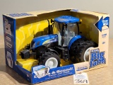 Ertl Big Farm T760 New Holland Tractor w/lights and sounds (NIB)