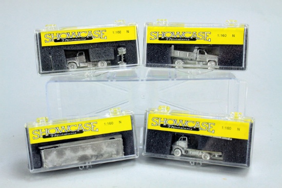 4 N Scale Showecase Miniatures; GMC Stake Bed SKU#12, GMC Topkick Dumpbed SKU#15, Mack Model B