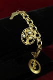 14 Gold Charm Bracelet w/ 14k Charms, 33.8 Grams
