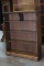 Brown Bookcase with Scalloped Top and Bottom