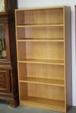 Light Oak Finished Bookcase (note hole at top left)