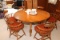 Maple Finished Round Table w/ Chairs & Leaves