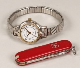 Swiss Army knife & Silver Colored Carriage Watch