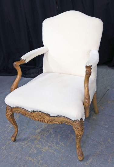 Antique Upholstered Arm Chair w/ Carved Details