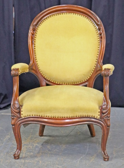 Oval Back Upholstered Arm Chair w/ Carved Details
