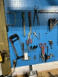 Pegboard Full of Tools: Scroll saw, Hacksaw, Pliers, Snips, Files, Pins, Pipe cutter, Stanley Speed