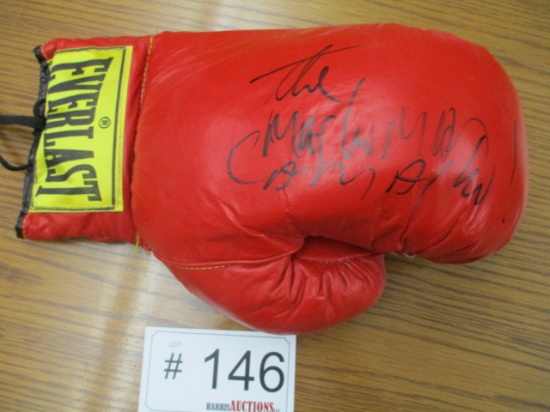 The Macho Man Camacho! Signed Boxing Glove