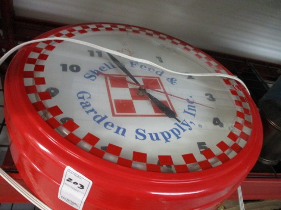 Shell's Feed and Garden Supply Clock