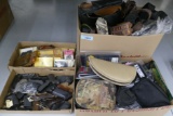 4 boxes of Gun Grips, Holsters Belts, etc