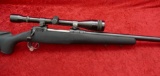 Savage Model 112 220 Swift Scoped Rifle
