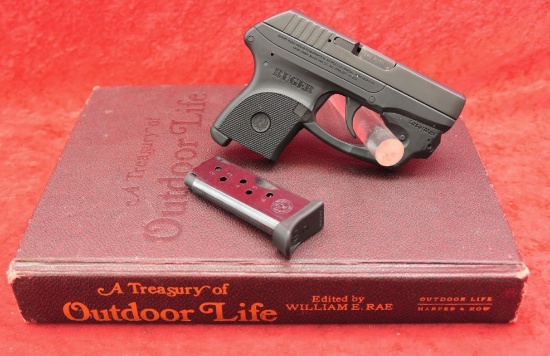 Ruger LCP w/Laser Grip in Book disguised Case