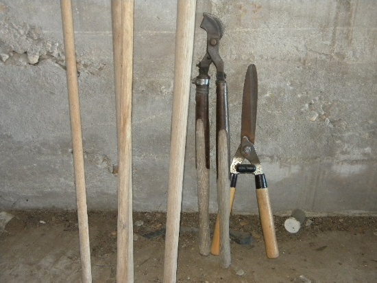 Yard Tools= Branch Saw; Two Shovels; Hand Scythes; Brush Scythe.