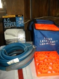 Camper Ac Cover; Heavy Potable Water Hose; 10 Plastic Jack Level Pads.