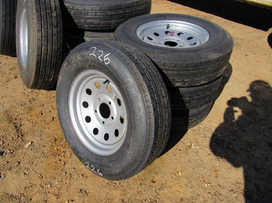 Set of 4 unused 205/75R15 tires & 5 hole wheels