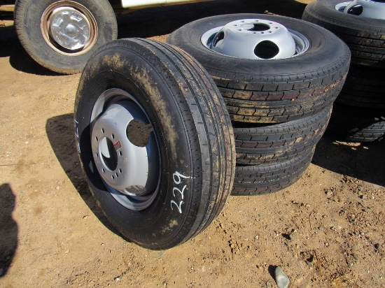 Set of 4 unused 235/80R16 tires & bud wheels