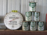 Quaker State thermometer and (6) oil cans