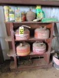 Wooden shelf and gas cans
