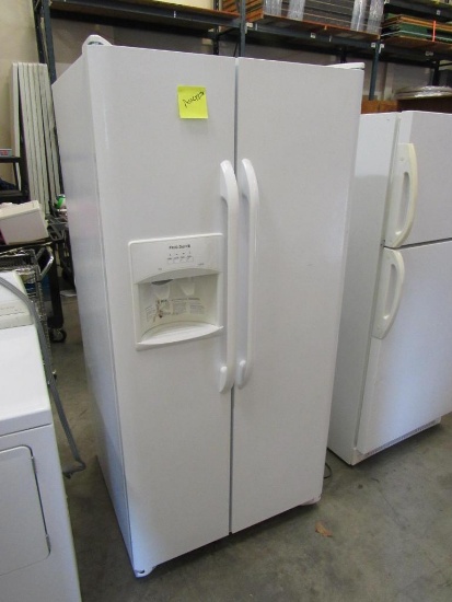 Frigidaire side by side refrigerator/freezer Mdl FFHS2311LWRA. with ice maker, water and ice in the