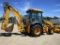 2003 JD 310 SG, 4 x 4 backhoe w/extended hoe (2' bucket), pilot controls, loader w/ 7 ½ material  bu