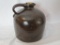 19th century molasses pitcher jug, Albany slip (spout chip)