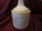 Sandell Bros. liquor jug 8 1/2 inches bottom signed RWSC (sm. Chips)