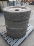 (4) Solid Skid Steer Tires On Rims