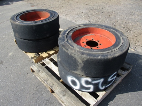 (4) Solid Skid Steer Tires On Steel Rims