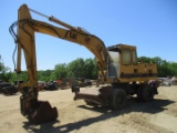 1991 Caterpillar 214BFT Rubber Tire Excavator